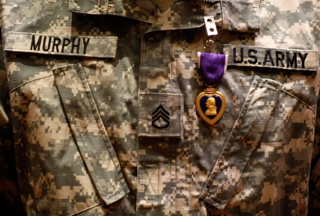 Injured U.S. Soldiers Honored At Purple Heart Ceremony